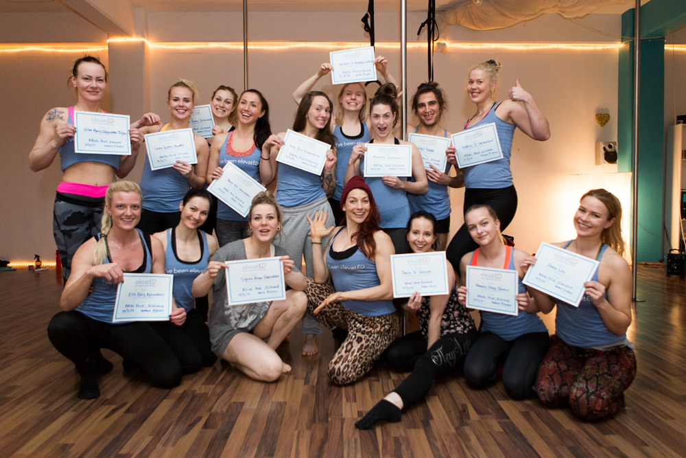 Eríal Pole's instuctors getting an ElevatED certificate with Marlo Fisken in 2015